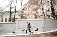 Young couple is kissing on the street